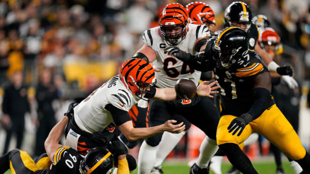 Pittsburgh Steelers linebacker T.J. Watt (90) forces Cincinnati Bengals quarterback Jake Browning (6) to fumble as he tallies a sack in the second quarter of the NFL 16 game between the Pittsburgh Steelers and the Cincinnati Bengals at Acrisure Stadium in Pittsburgh on Saturday, Dec. 23, 2023. The Steelers led 24-0 at halftime.  