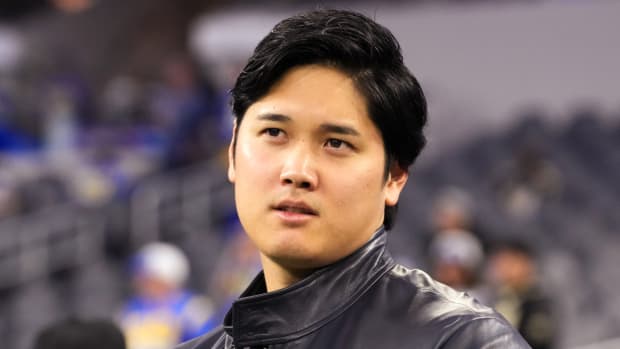 Dodgers pitcher Shohei Ohtani attends a Rams game.