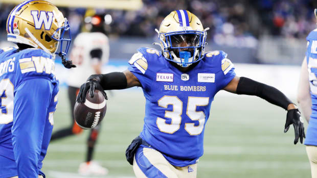 Nov 11, 2023; Winnipeg, Manitoba, CAN; Winnipeg Blue Bombers defensive back Demerio Houston (35) celebrates his interception during the second half of the game against the BC Lions at IG Field. Winnipeg wins 24-13 to advance to 2023 Grey Cup. Mandatory Credit: Bruce Fedyck-USA TODAY Sports.  