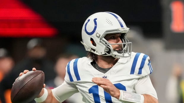 Indianapolis Colts quarterback Gardner Minshew II (10) draws back to pass Sunday, Dec. 24, 2023, during a game against the Atlanta Falcons at Mercedes-Benz Stadium in Atlanta.