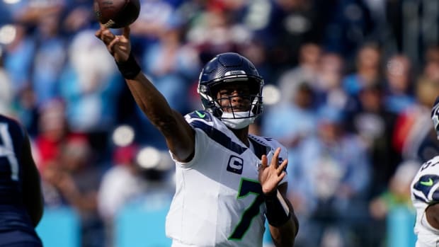 Seattle Seahawks quarterback Geno Smith (7) throws against the Tennessee Titans during the first quarter at Nissan Stadium in Nashville, Tenn.,