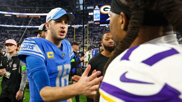 Dec 24, 2023; Minneapolis, Minnesota, USA; Detroit Lions quarterback Jared Goff (16) and Minnesota Vikings wide receiver K.J. Osborn (17) shake hands after the game at U.S. Bank Stadium. With the win the Detroit Lions clinched the NFC North.