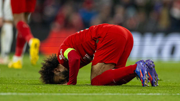 Mo Salah pictured praying after scoring for Liverpool in a 4-0 win over LASK in November 2023
