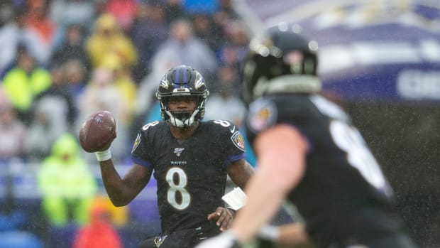 Dec 1, 2019; Baltimore, MD, USA; Baltimore Ravens quarterback Lamar Jackson (8) looks to pass to tight end Hayden Hurst (81) during the first half against the San Francisco 49ers at M&T Bank Stadium. Mandatory Credit: Tommy Gilligan-USA TODAY Sports  