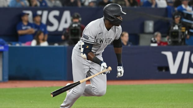 Sep 27, 2023; Toronto, Ontario, CAN; New York Yankees center fielder Estevan Florial (90) hits a single against the Toronto Blue Jays in the fourth inning at Rogers Centre.