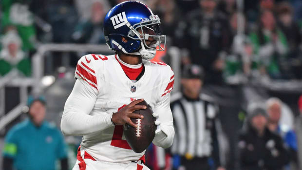 Dec 25, 2023; Philadelphia, Pennsylvania, USA; New York Giants quarterback Tyrod Taylor (2) rolls out the pocket during the third quarter against the New York Giants at Lincoln Financial Field.