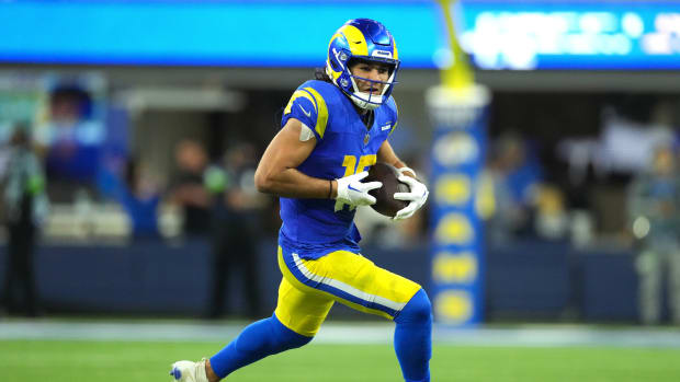Dec 21, 2023; Inglewood, California, USA; Los Angeles Rams wide receiver Puka Nacua (17) carries the ball against the New Orleans Saints in the second half at SoFi Stadium.