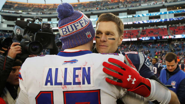 Dec 23, 2018; Foxborough, MA, USA; New England Patriots quarterback Tom Brady (12) meets Buffalo Bills quarterback Josh Allen (17) after the game at Gillette Stadium. Patriots defeated the Bills 24-12.
