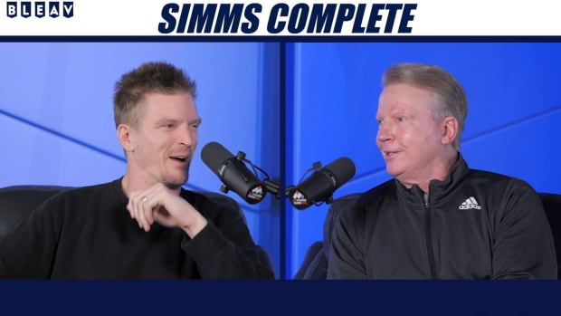 Phil and Matt Simms discuss the benching of Russell Wilson