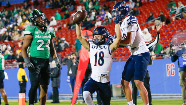 UTSA Roadrunners wide receiver David Amador (18) scores a touchdown during the third quarter against the Marshall Thundering Herd at Toyota Stadium. 