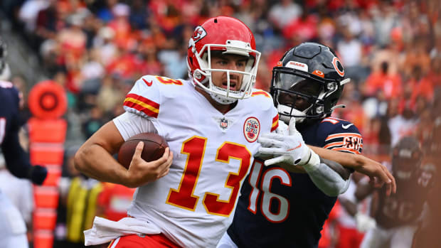 Aug 13, 2022; Chicago, Illinois, USA; Kansas City Chiefs quarterback Dustin Crum (13) carries the ball against the Chicago Bears at Soldier Field. Chicago defeated Kansas City 19-14. Mandatory Credit: Jamie Sabau-USA TODAY Sports  
