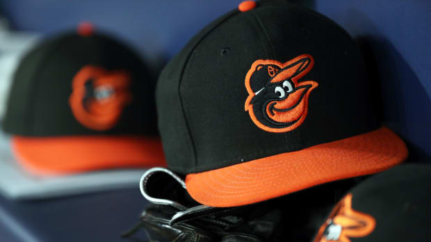 Apr 18, 2019; St. Petersburg, FL, USA; A detail view of Baltimore Orioles hats and gloves in the dugout at Tropicana Field. Mandatory Credit: Kim Klement-USA TODAY Sports