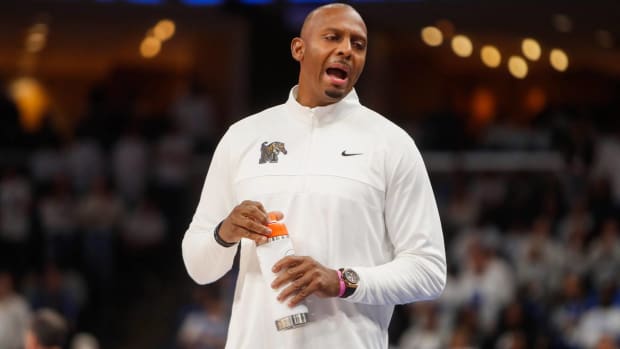Memphis head coach Penny Hardaway reacts while coaching in a game.