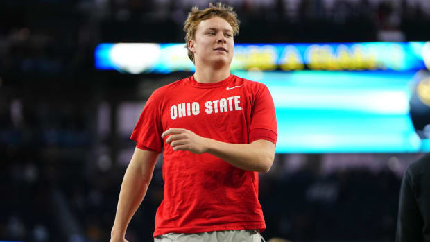 Ohio State quarterback Devin Brown warms up ahead of a game.