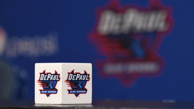 A DePaul Blue Demons logo on a cube prior to a press conference.