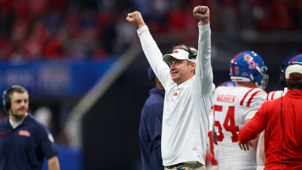 Ole Miss coach Lane Kiffin celebrates a touchdown in the Rebels' 38-25 win over Penn State in the 2023 Peach Bowl.