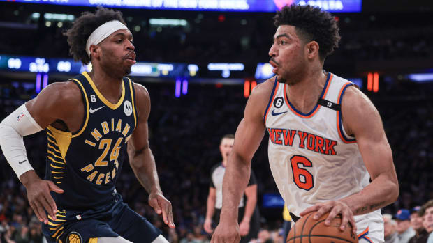 Apr 9, 2023; New York, New York, USA; New York Knicks guard Quentin Grimes (6) dribbles against Indiana Pacers guard Buddy Hield (24) during the second half at Madison Square Garden.
