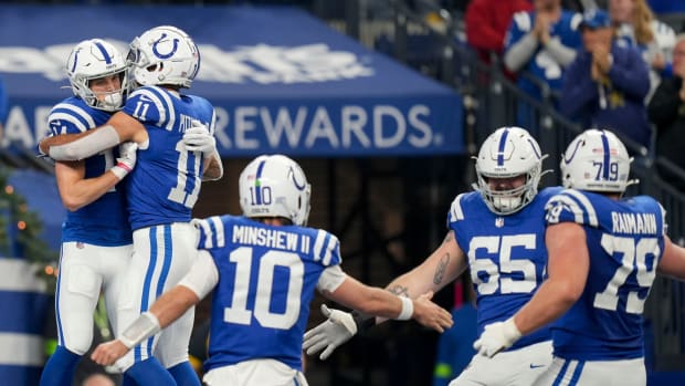 Indianapolis Colts wide receiver Alec Pierce (14) celebrates with Indianapolis Colts wide receiver Michael Pittman Jr. (11) after scoring a touchdown Sunday, Dec. 31, 2023, during a game against the Las Vegas Raiders at Lucas Oil Stadium in Indianapolis.  