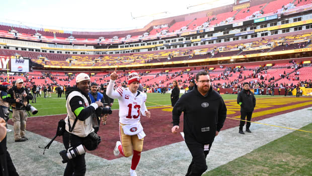 Dec 31, 2023; Landover, Maryland, USA; San Francisco 49ers quarterback Brock Purdy (13) leaves the field after defeating the Washington Commanders at FedExField. Mandatory Credit: Brad Mills-USA TODAY Sports  