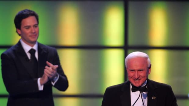 Jimmie Johnson applauds NASCAR legend Cale Yarborough during the 2008 NASCAR Awards Ceremony in New York City. Photo: Getty Images via NASCAR/ISC Archives.