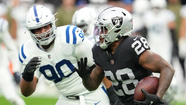 Nov 13, 2022; Paradise, Nevada, USA; Las Vegas Raiders running back Josh Jacobs (28) rushes against the Indianapolis Colts during the first half at Allegiant Stadium.
