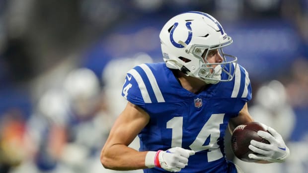 Indianapolis Colts wide receiver Alec Pierce (14) looks back as he runs to the end zone for a touchdown Sunday, Dec. 31, 2023, during a game against the Las Vegas Raiders at Lucas Oil Stadium in Indianapolis.  