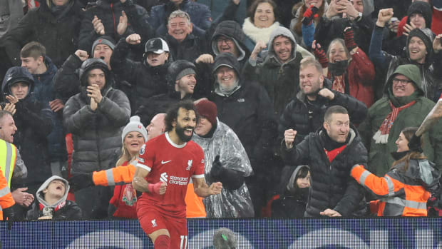 Mo Salah pictured celebrating after scoring his 150th Premier League goal for Liverpool, during a home game against Newcastle United in January 2024