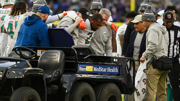 Miami Dolphins linebacker Bradley Chubb (2) helped to the cart after being injured during the second half against the Baltimore Ravens at M&T Bank Stadium.