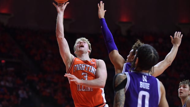 Illinois Fighting Illini guard Marcus Domask (3) shoots the ball during the first half against the Northwestern Wildcats at State Farm Center.