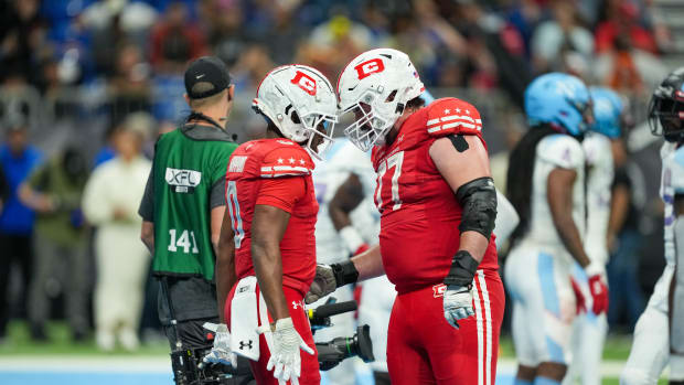 May 13, 2023; San Antonio, TX, USA; DC Defenders wide receiver Josh Hammond (0) celebrates his touchdown with offensive lineman Liam Fornadel (77) in the second half at the Alamodome. Mandatory Credit: Daniel Dunn-USA TODAY Sports