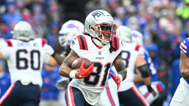 Dec 31, 2023; Orchard Park, New York, USA; New England Patriots wide receiver DeMario Douglas (81) runs a sweep against the Buffalo Bills in the first quarter at Highmark Stadium.