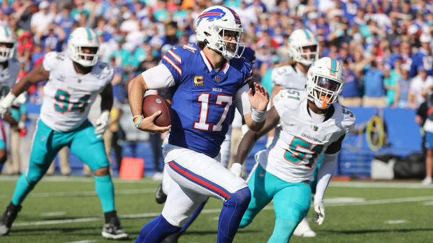 Josh Allen running in the open field against the Dolphins