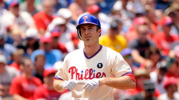 Jun 30, 2011; Philadelphia, PA, USA; Philadelphia Phillies second baseman Chase Utley (26) during the first inning against the Boston Red Sox at Citizens Bank Park. The Red Sox defeated the Phillies 5-2. Mandatory Credit: Howard Smith-USA TODAY Sports