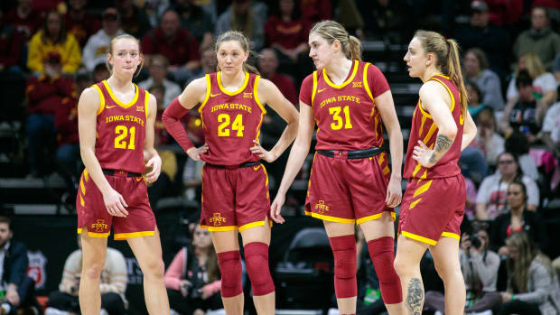 Mar 12, 2023; Kansas City, MO, USA; Iowa State Cyclones players stand mid court during a break in play during the second half against the Texas Longhorns at Municipal Auditorium. Mandatory Credit: William Purnell-USA TODAY Sports  