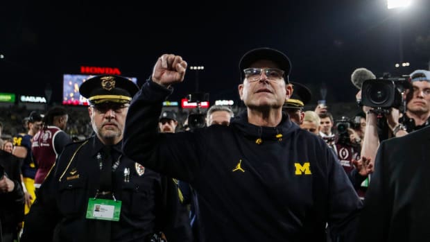 Michigan head coach Jim Harbaugh waves at fans to celebrate a 27-20 Rose Bowl win over Alabama at the 2024 Rose Bowl in Pasadena, Calif., on Monday, Jan. 1, 2024.  