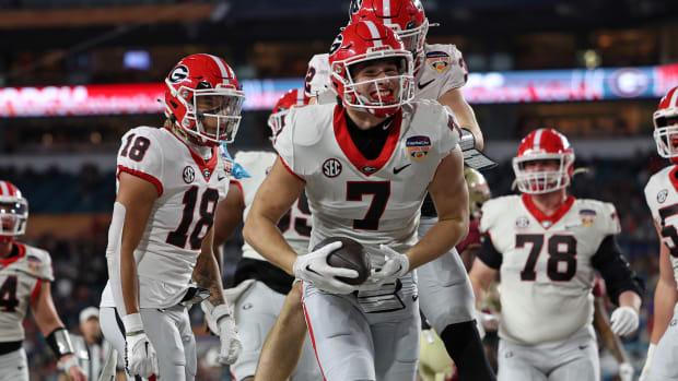 Dec 30, 2023; Miami Gardens, FL, USA; Georgia Bulldogs tight end Lawson Luckie (7) reacts after scoring a touchdown against the Florida State Seminoles during the second half in the 2023 Orange Bowl at Hard Rock Stadium. (Nathan Ray Seebeck / USA TODAY Sports).