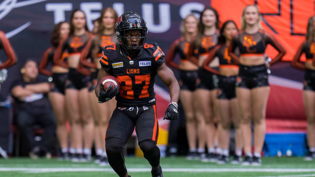 Jun 17, 2023; Vancouver, British Columbia, CAN; BC Lions receiver Terry Williams (87) returns a kick against the Edmonton Elks during the first half in at BC Place. Mandatory Credit: Bob Frid-USA TODAY Sports  