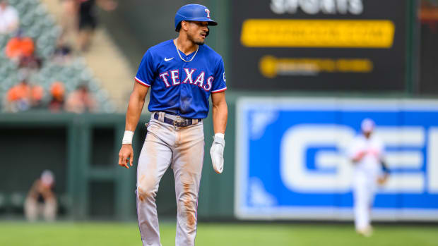May 28, 2023; Baltimore, Maryland, USA; Texas Rangers left fielder Bubba Thompson (8) takes a lead off of second base during the eighth inning against the Baltimore Orioles at Oriole Park at Camden Yards.