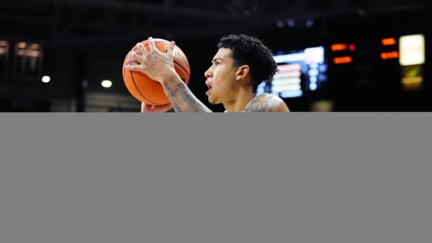 Colorado Buffaloes guard KJ Simpson (2) lines up a shot in the second half against the Washington State Cougars at the CU Events Center