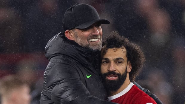 Manager Jurgen Klopp pictured hugging Mo Salah after Liverpool's 4-2 win over Newcastle in January 2024