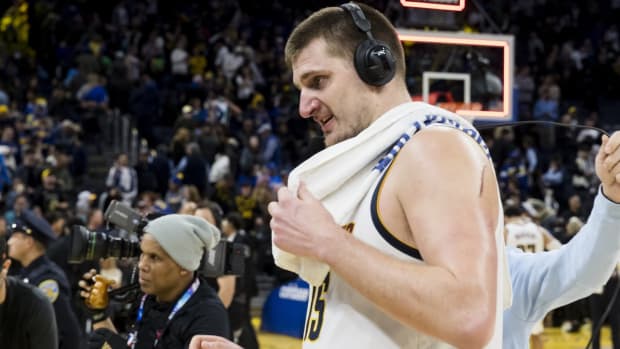 Jan 4, 2024; San Francisco, California, USA; Denver Nuggets center Nikola Jokic (15) talks to the media after a last-second shot resulted in a win against the Golden State Warriors by Jokic at Chase Center. Mandatory Credit: John Hefti-USA TODAY Sports