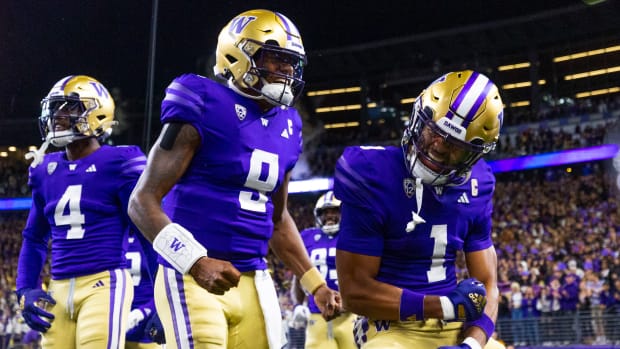 Sep 23, 2023; Seattle, Washington, USA; Washington Huskies wide receiver Rome Odunze (1) celebrates with quarterback Michael Penix Jr. (9) after returning a punt for a touchdown during the first quarter at Alaska Airlines Field at Husky Stadium.