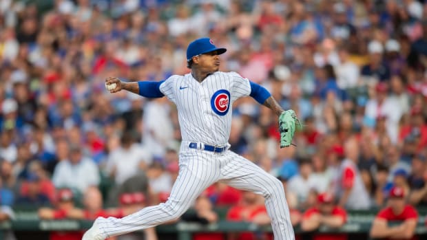 Jul 31, 2023; Chicago, Illinois, USA; Chicago Cubs starting pitcher Marcus Stroman (0) pitches during the first inning against the Cincinnati Reds at Wrigley Field. Mandatory Credit: Patrick Gorski-USA TODAY Sports  
