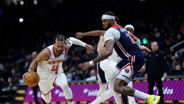 Jan 6, 2024; Washington, District of Columbia, USA; New York Knicks guard Jalen Brunson (11) drives to the basket as Washington Wizards center Daniel Gafford (21) defends in the second quarter at Capital One Arena. Mandatory Credit: Geoff Burke-USA TODAY Sports