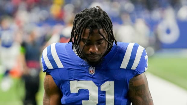 Colts running back Tyler Goodson leaves the field with his head down after a season-ending loss to the Houston Texans