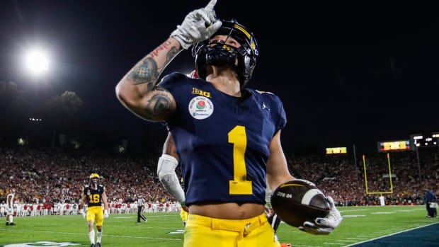 Rose Bowl: Michigan wide receiver Roman Wilson celebrates a touchdown against Alabama during the second half.
