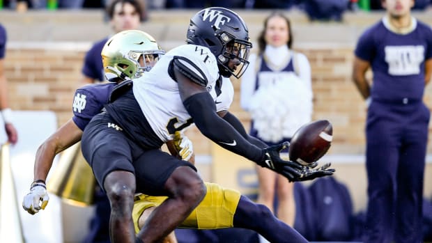 Nov 18, 2023; South Bend, Indiana, USA; Wake Forest Demon Deacons safety Malik Mustapha (3) breaks up a pass intended for Notre Dame Fighting Irish wide receiver Jordan Faison (80) in the first quarter at Notre Dame Stadium.