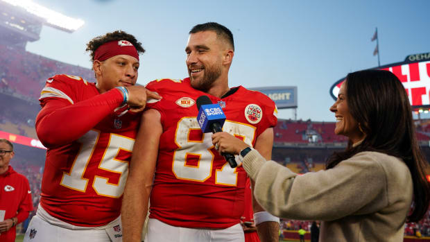 Oct 22, 2023; Kansas City, Missouri, USA; Kansas City Chiefs quarterback Patrick Mahomes (15) and tight end Travis Kelce (87) talk with reporter Tracy Wolfson after defeating the Los Angeles Chargers at GEHA Field at Arrowhead Stadium. Mandatory Credit: Jay Biggerstaff-USA TODAY Sports  