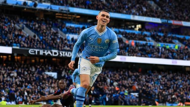Phil Foden pictured celebrating after scoring for Manchester City in a 5-0 win over Huddersfield Town in the FA Cup in January 2024