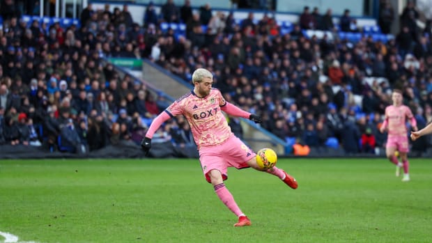 Patrick Bamford pictured volleying the ball to score a spectacular goal for Leeds in a 3-0 win at Peterborough in the FA Cup in January 2024